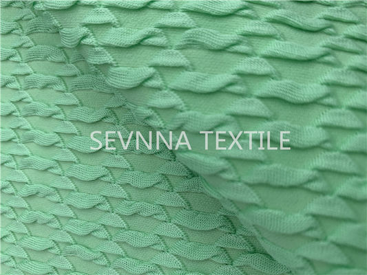 Чеканьте зеленую текстуру поли пряжа повторно использовала лайкра Repreve ткани Swimwear